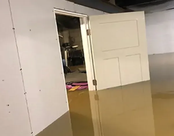 Water standing in a finished basement room